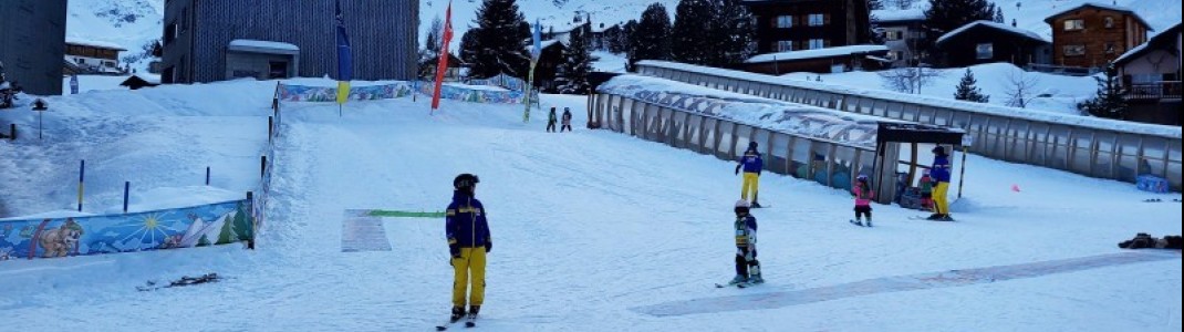 Ski instructors look after beginners and children in the Innerarosa children's area.