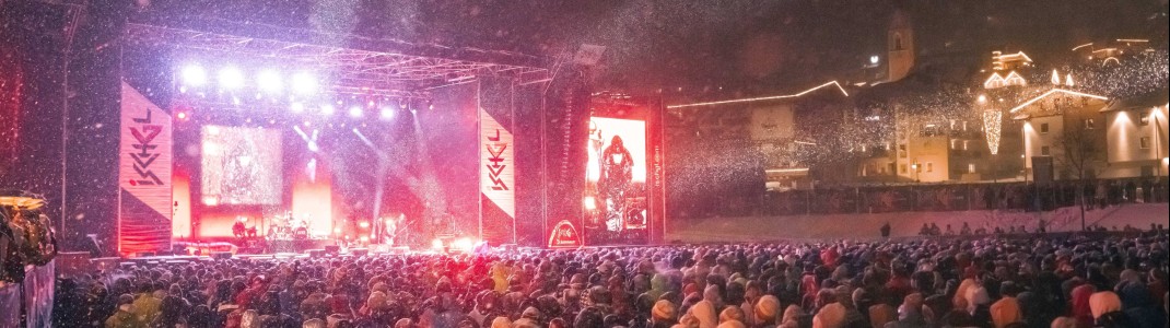 The massive open-air stage is set up at the base station of the Silvretta cable car.