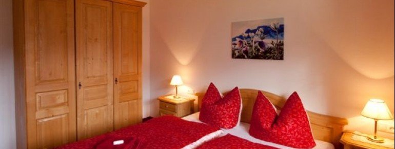 Beatiful Bedroom with extra couch and safe