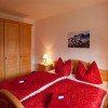 Beatiful Bedroom with extra couch and safe