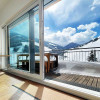 Wohnraum mit Ausblick über Hinterglemm und Westgipfel mit Zwölferkogel