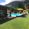 Alpenhotel Tirolerhof "Garten mit kleinen Kinderspielplatz und Tischtennisplatte"
