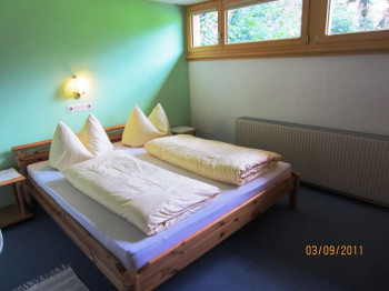 eins der 4 Schlafzimmern