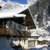 Ferienhaus dahinter Leoganger Steinberge