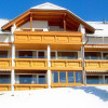 Haus Löger mit seinen Südbalkonen