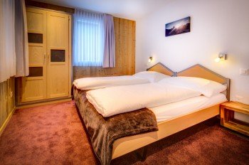 Schlafzimmer Alpine Lodge