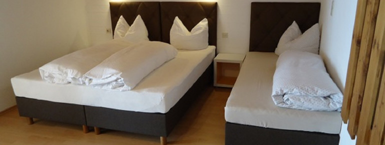 Dreibettzimmer