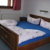 Schlafzimmer mit Zugang zum Balkon