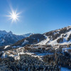 The ski resort features mainly blues and reds.