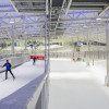 A cross-country ski track runs above the alpine slope.