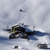 On the top, La Borda de la Compa restaurant