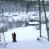 Snowboarderinnen im Steilhang