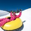 Eine Reise zurück in die Kindheit? Snowtubing macht's möglich!