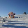 Im Kinderland lernen angehende Wintersportler das Skifahren