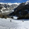Aussicht auf die schwarze Abfahrt Milk Run vom San Sophia Outlook. Im Hintergrund sind die Free Gondola und der Coonskin Lift zu sehen.
