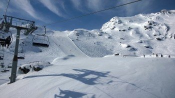 Blick von der Krimmlalm auf die rote Piste Nr. 21a