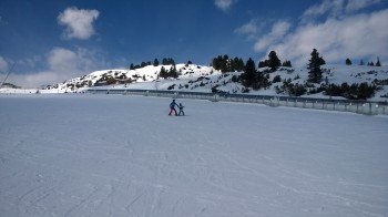 Kinderland mit Zauberteppichlift an der Bergstation der Isskogelbahn